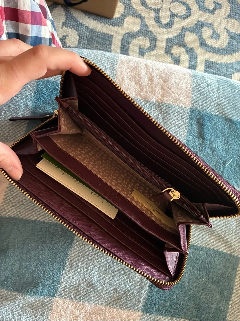 kate spade plum/burgundy zip-around card wallet with gold logo